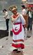 China: Chinese tourist dressed in Miao minority costume next to the Tuo River, Fenghuang, Hunan Province